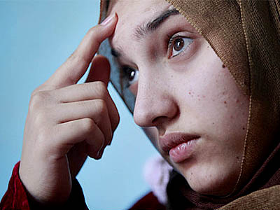 इराक युद्धको वर्णन गर्छन, निर्दोष केटीका घाउहरु